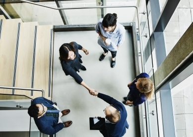 Business people meeting in stairwell